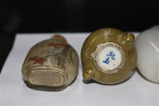Four assorted Chinese snuff bottles largest 9cm